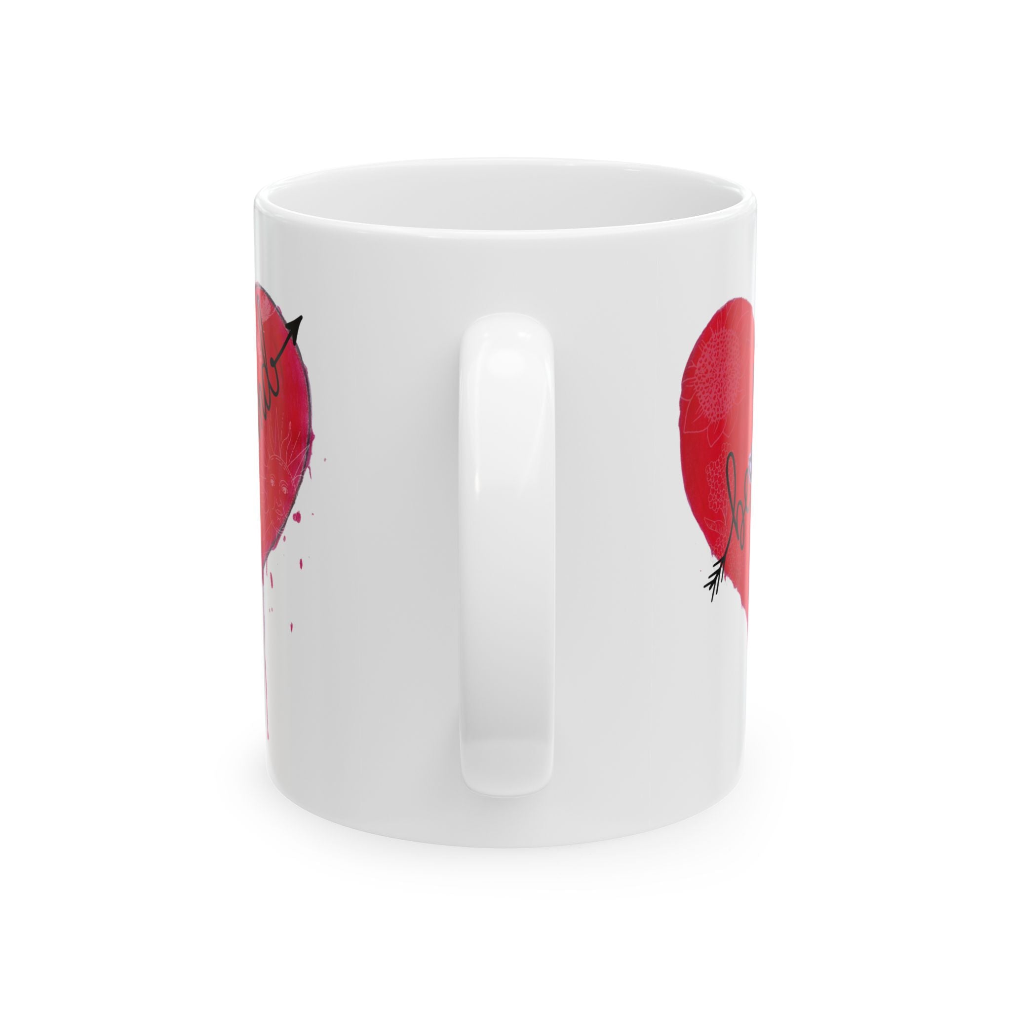 White mug with red heart designs on a white background